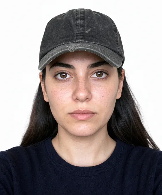 Incorrect ID photo example wearing a hat