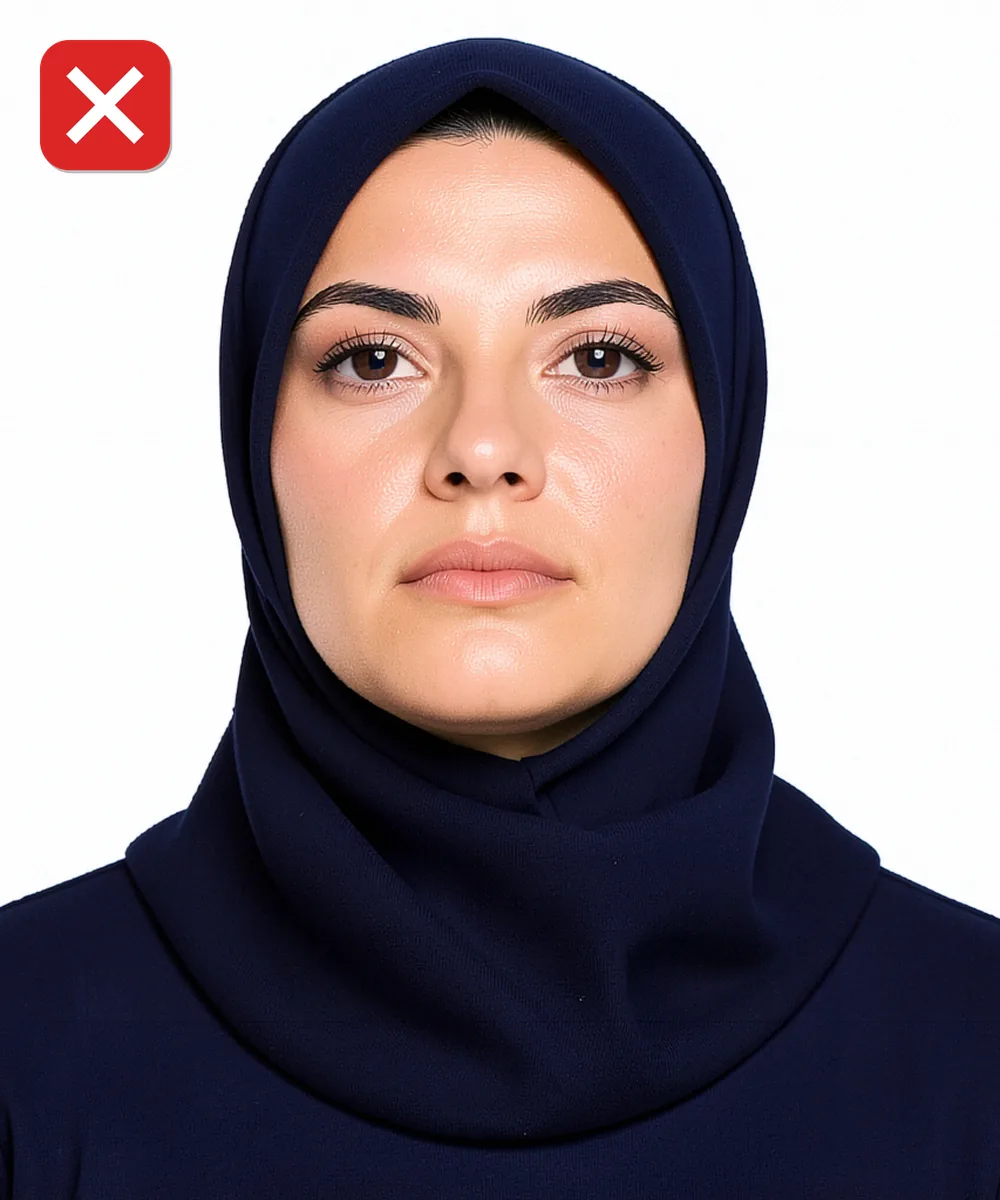 Sultanbeyli'de Vesikalık Fotoğraf — Yanlış vesikalık örneği: alttan yukarı çekim