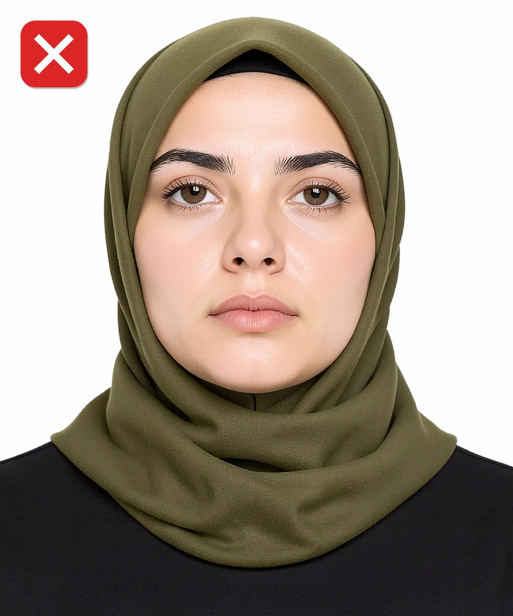 Ümraniye'de Vesikalık Fotoğraf — Yanlış vesikalık örneği: alttan yukarı çekim